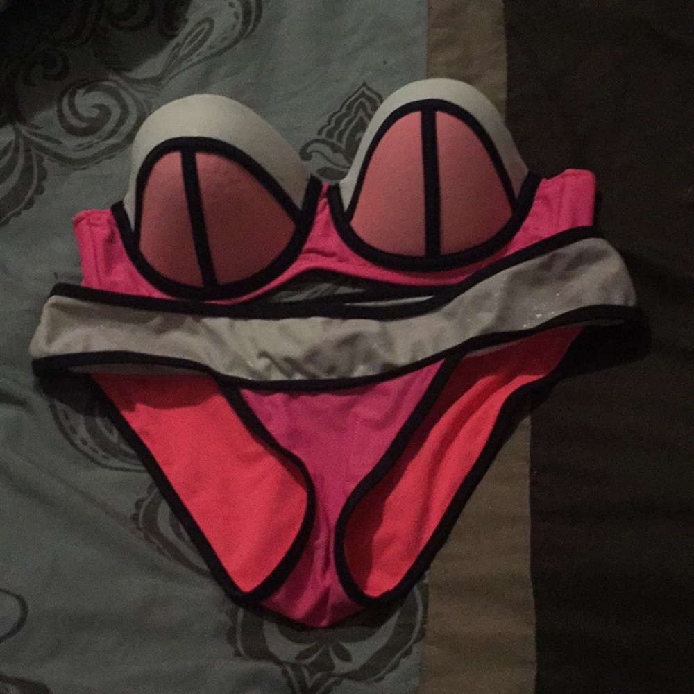 White and pink with black outline bathing suit